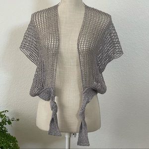 Woman’s gray knit shrug